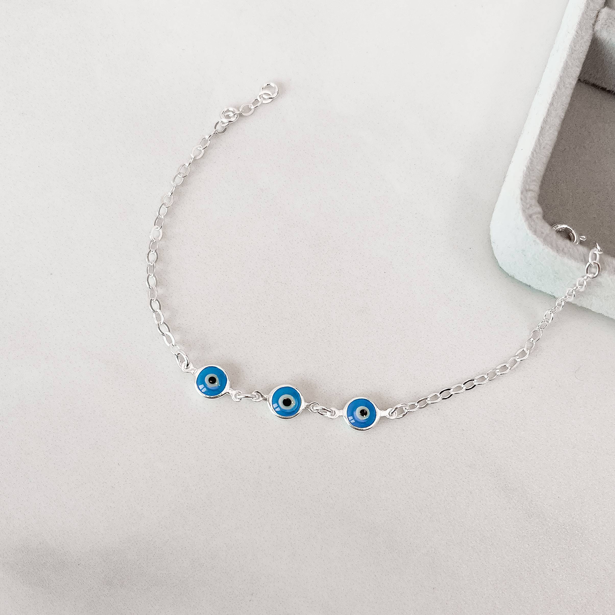 Imagem Secundária Pulseira entremeios olho grego azul 7mm