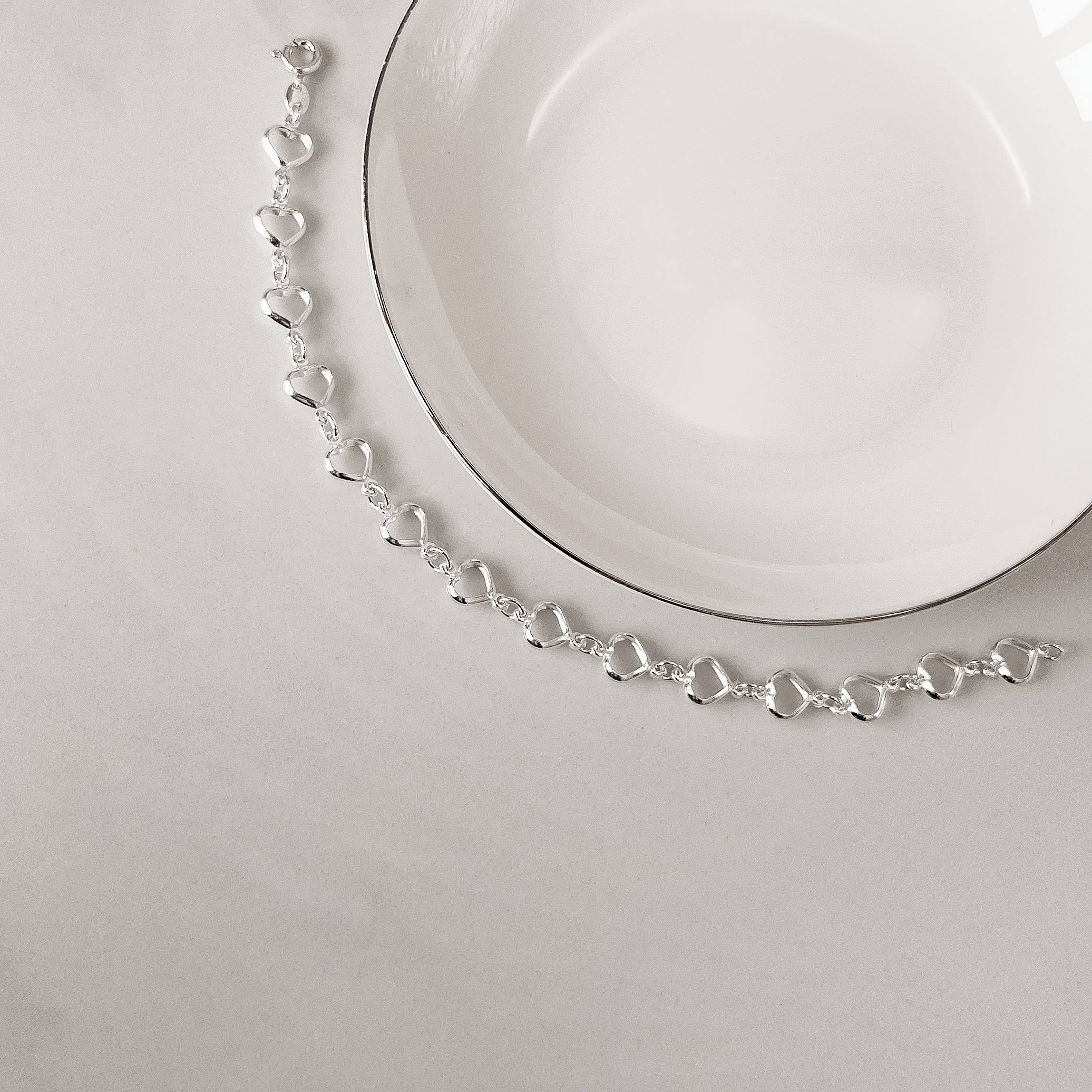 Pulseira entremeio corações vazados 8mm