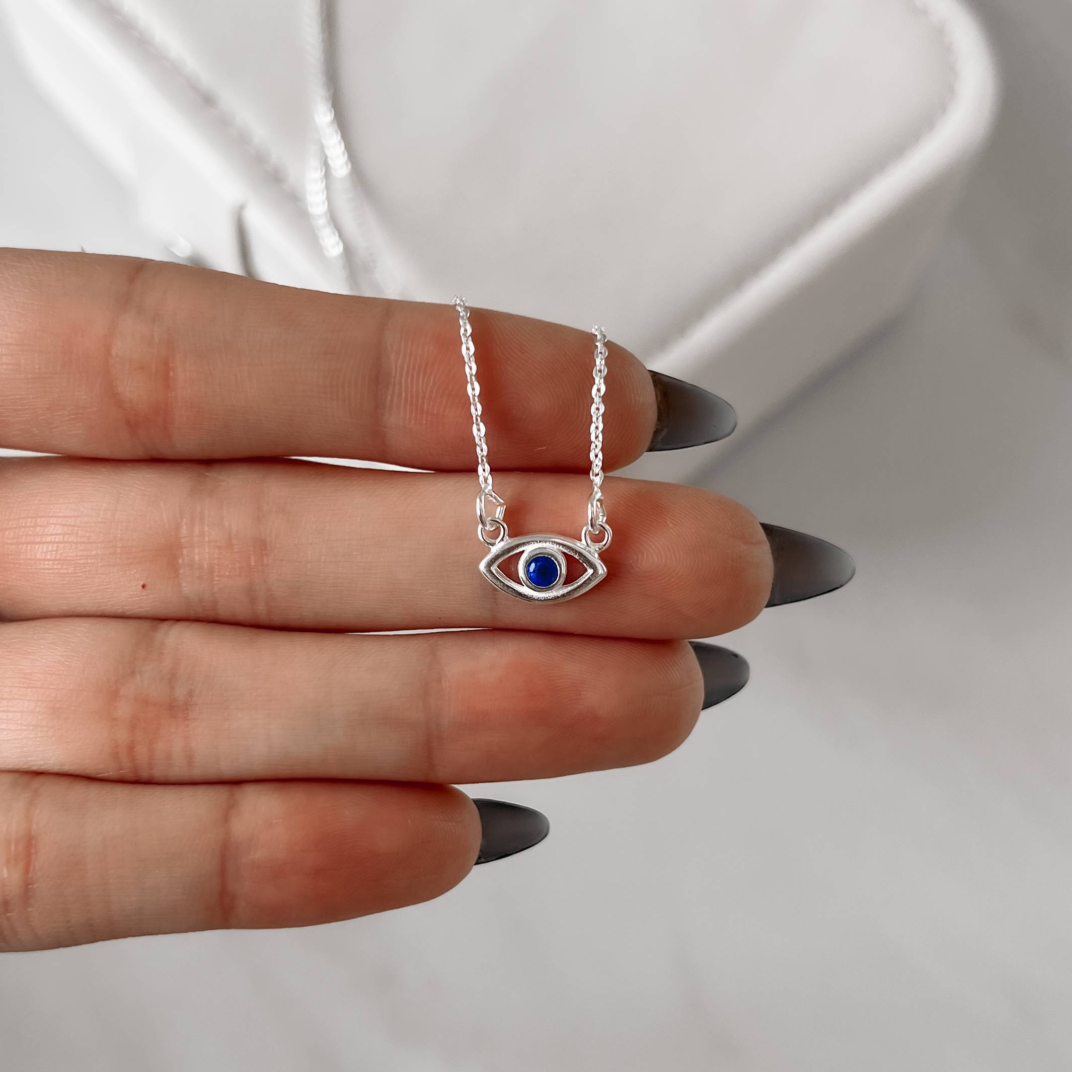 Imagem Secundária Colar olho com zircônia azul 12mm corrente cadeado 40cm com alongadora