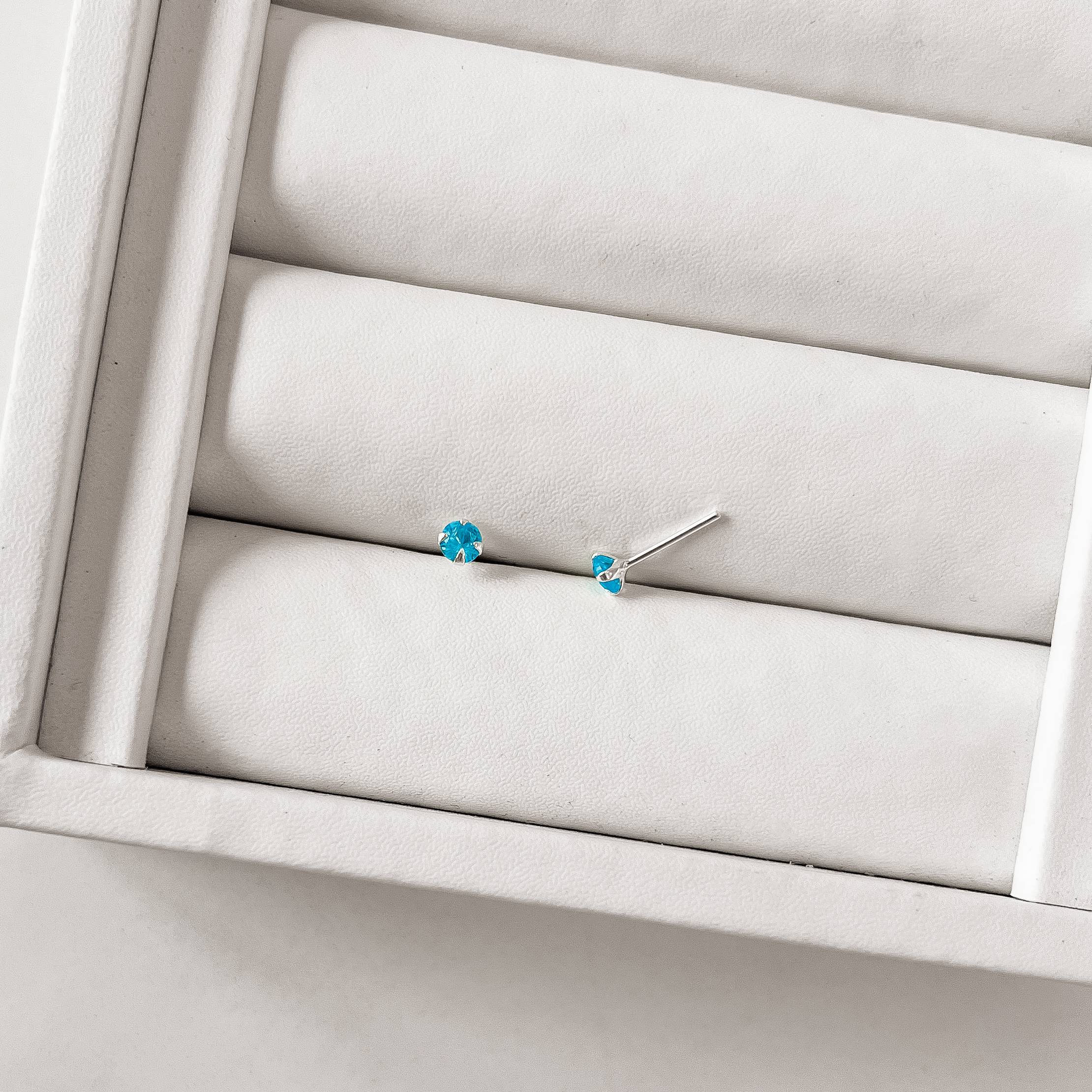 Imagem Secundária Brinco zircônia redonda azul 4mm