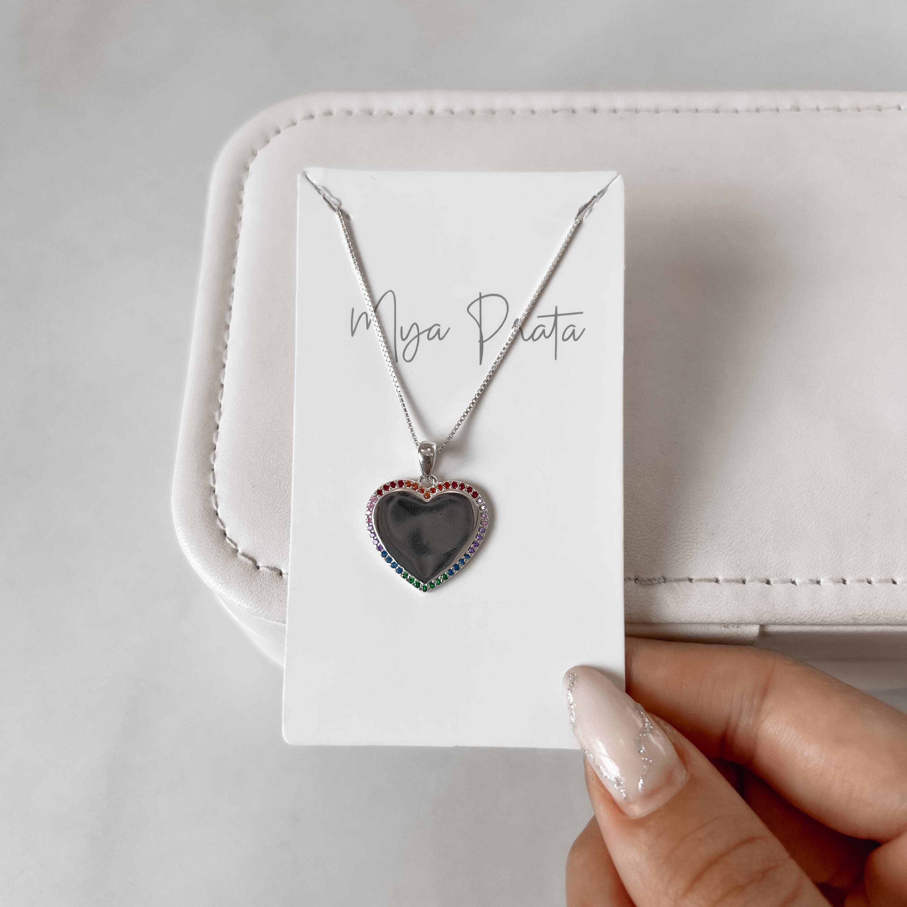 Imagem Secundária Colar pingente coração borda cravejada colorida 17mm 45cm