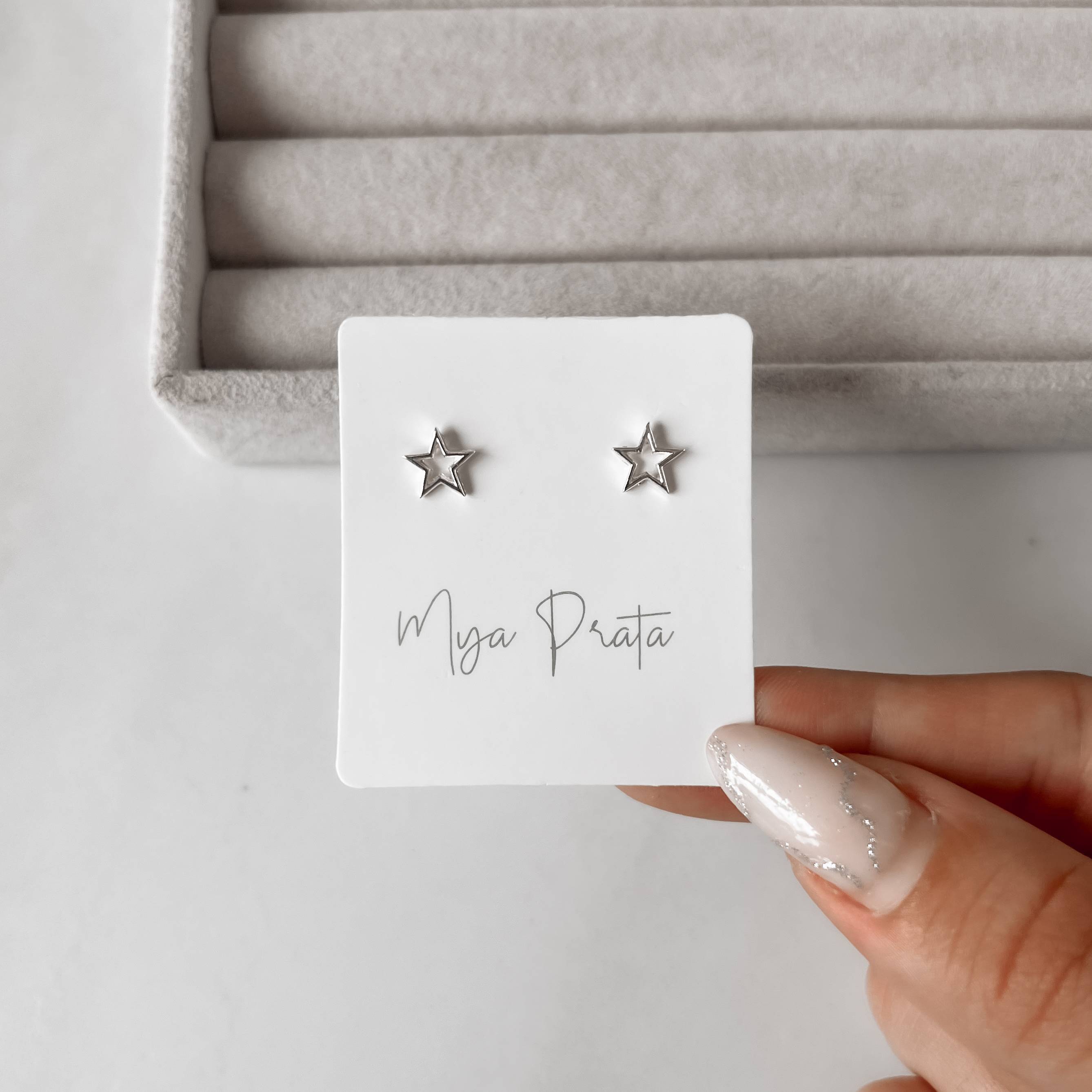 Imagem Secundária Brinco estrela lisa vazada 7mm