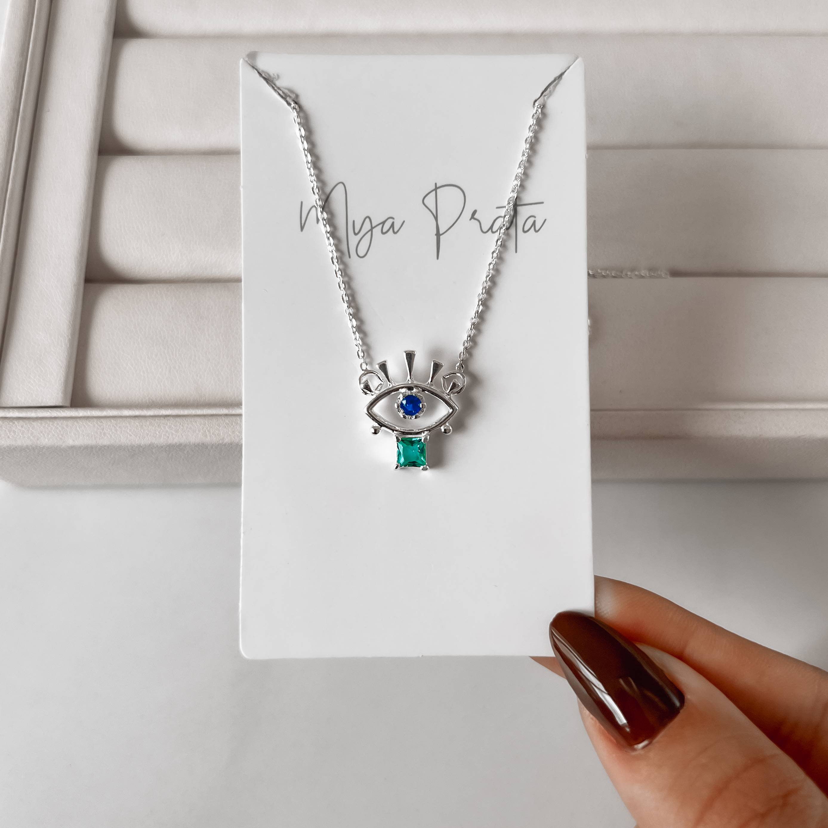 Colar olho com zircônias azul e acqua 17mm corrente cadeado 40cm com alongadora