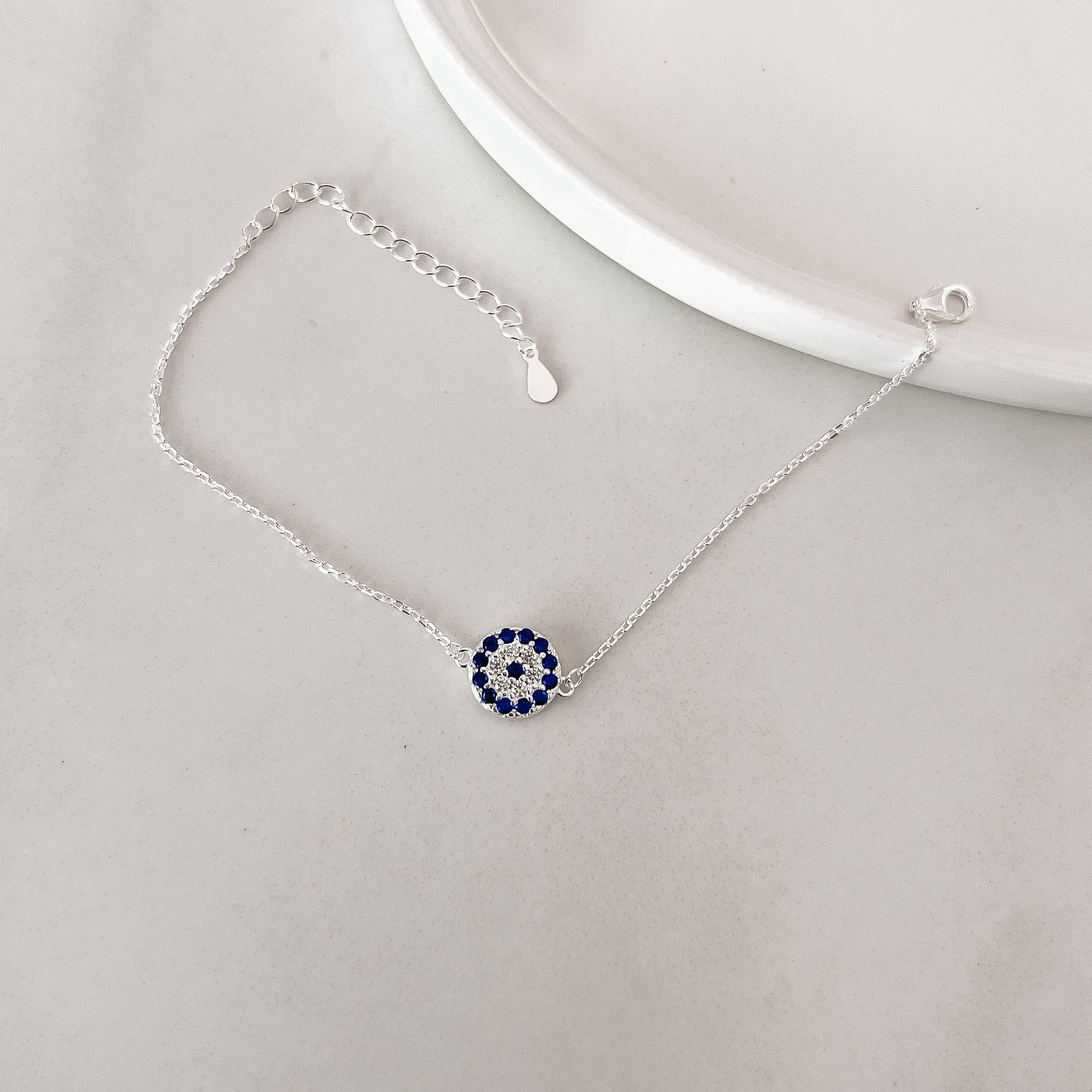 Pulseira entremeio círculo cravejado cristal e azul 10mm