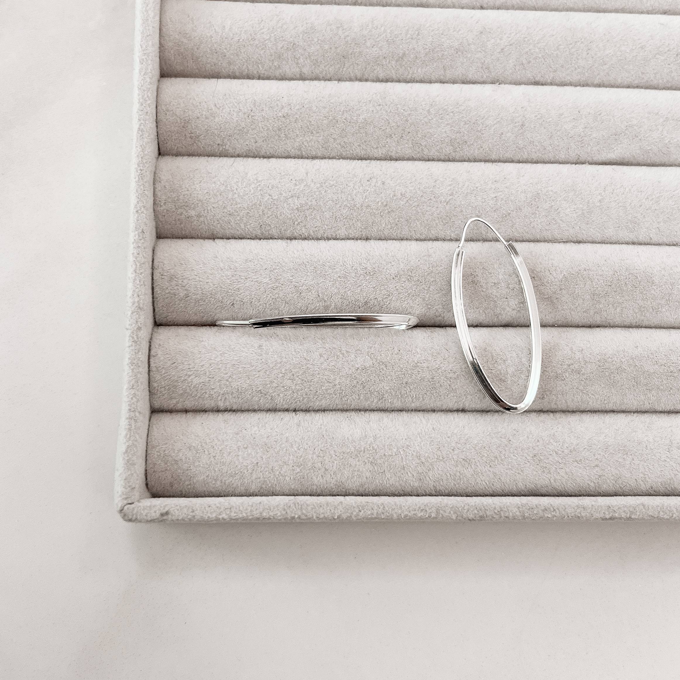 Imagem Argola oval 37x13mm fio triângulo