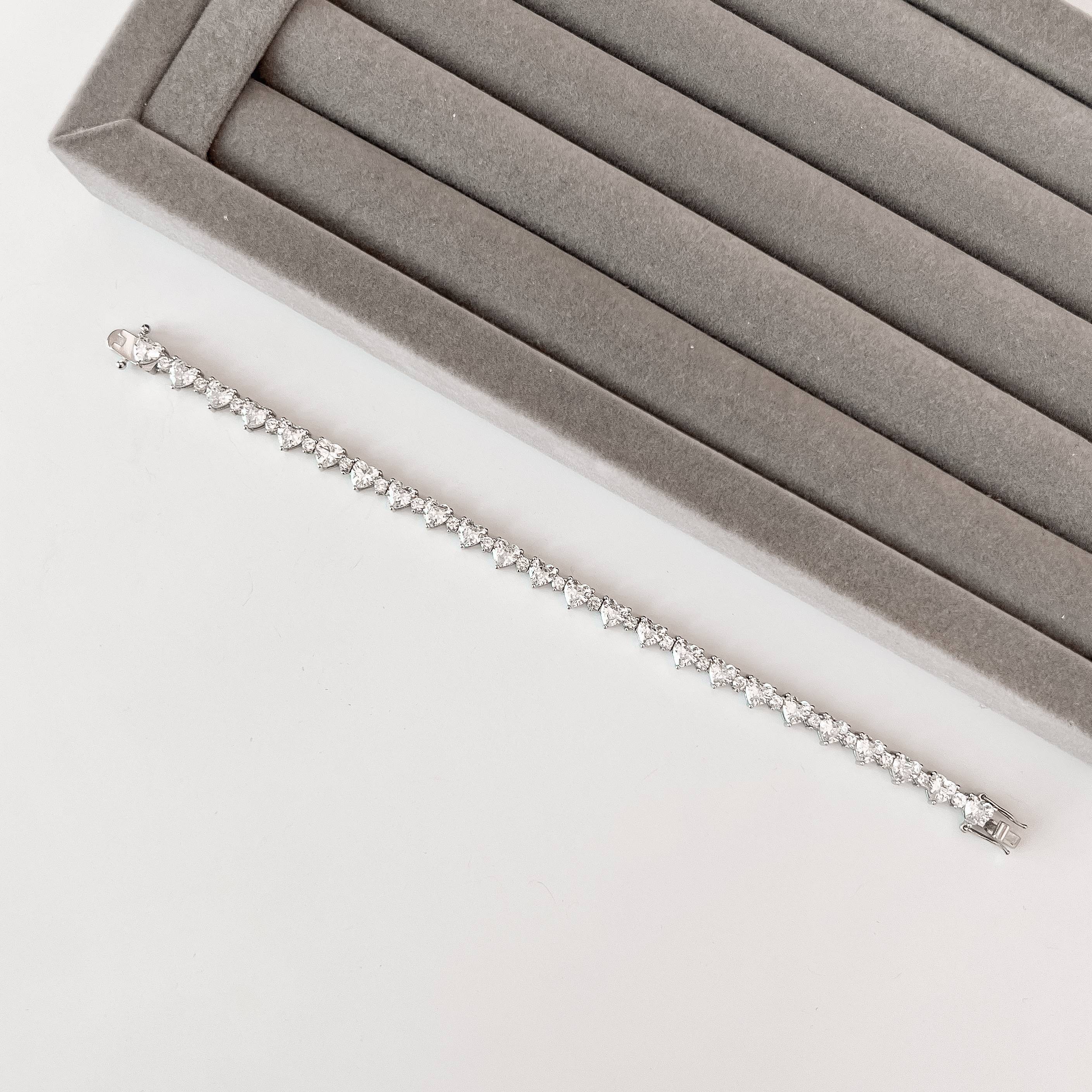 Pulseira Riviera zircônias coração e redonda 5.5 fecho gaveta 18cm ródio