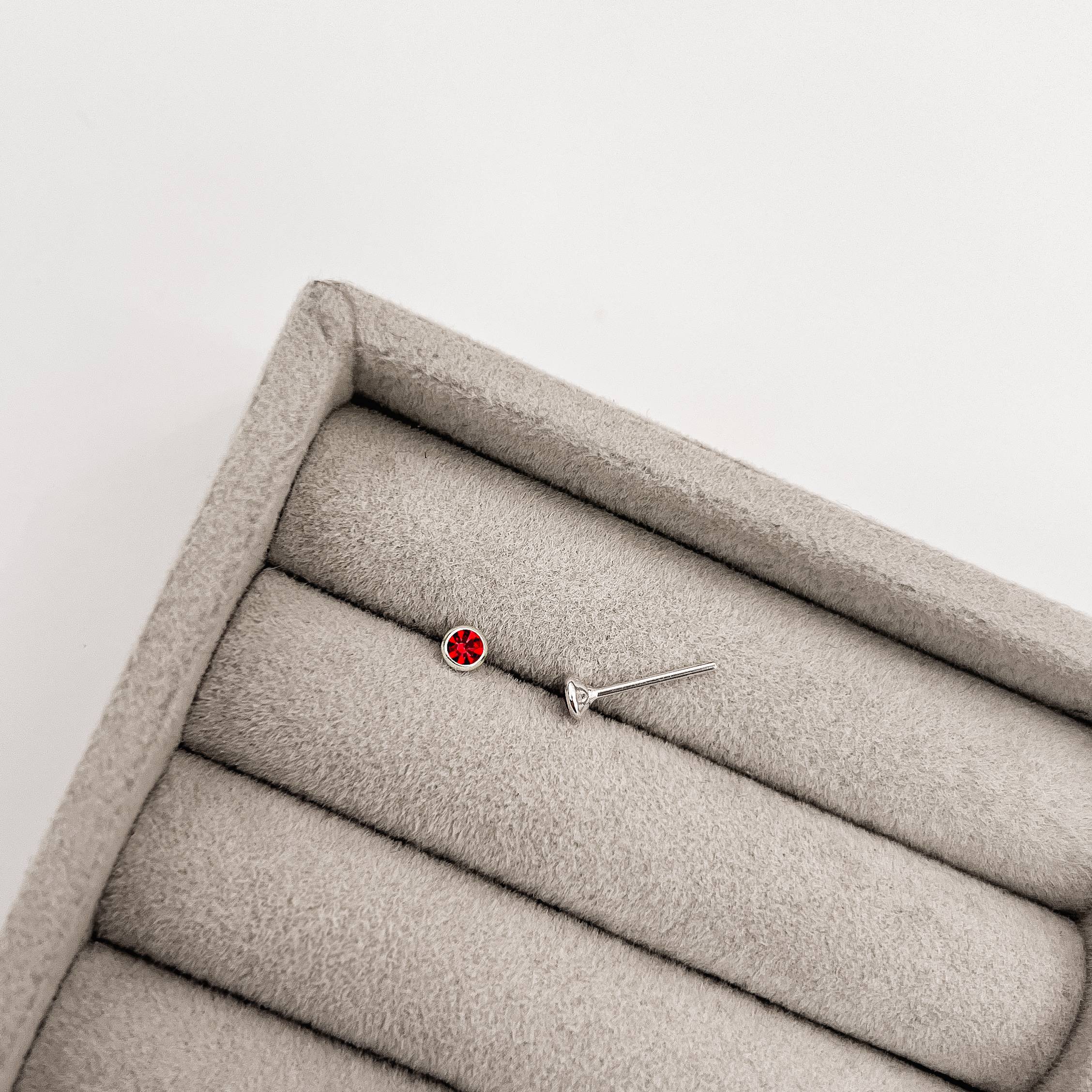 Imagem Brinco zircônia redonda embutida vermelho 3mm