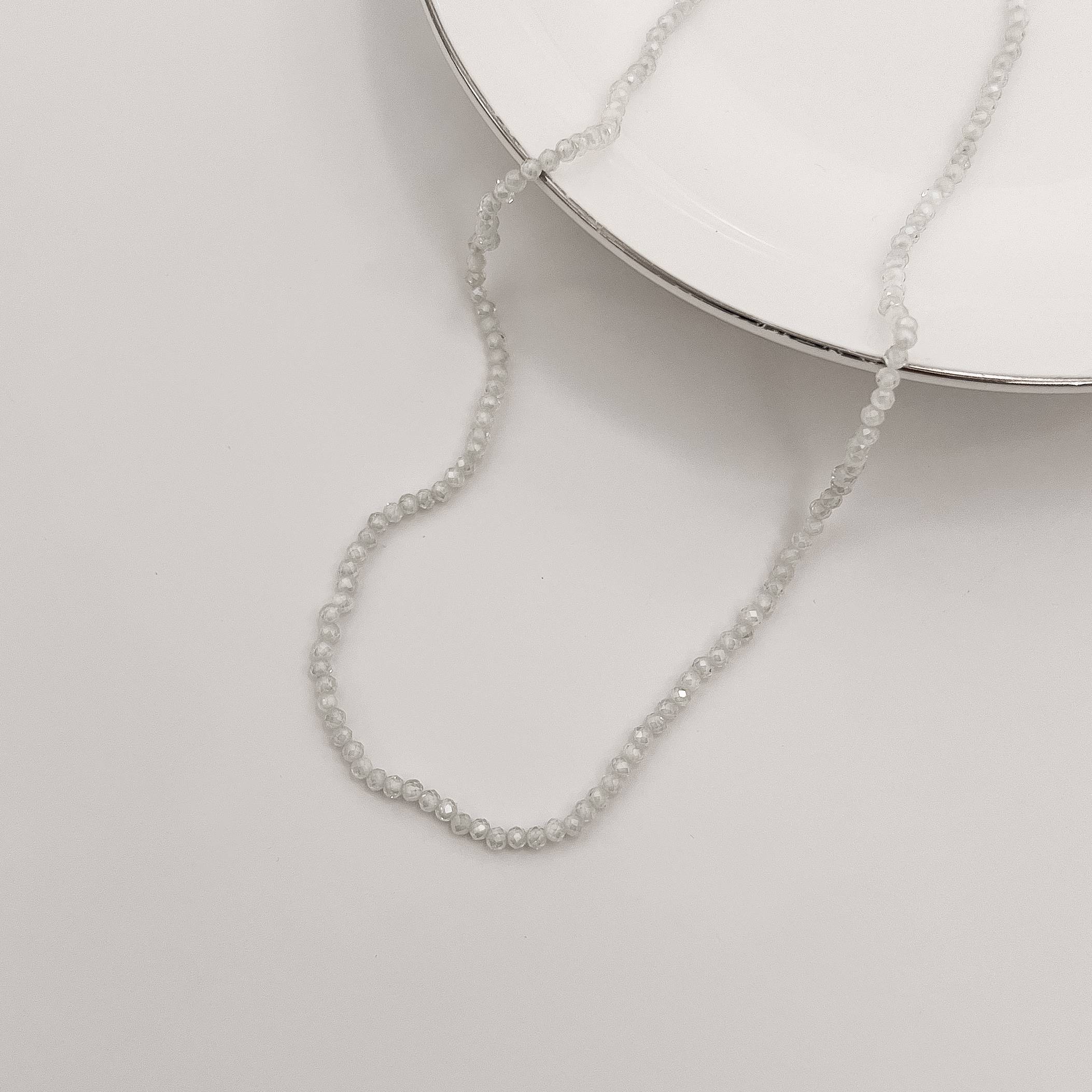 Imagem Choker zircônia redonda facetada off white 2mm com alongadora