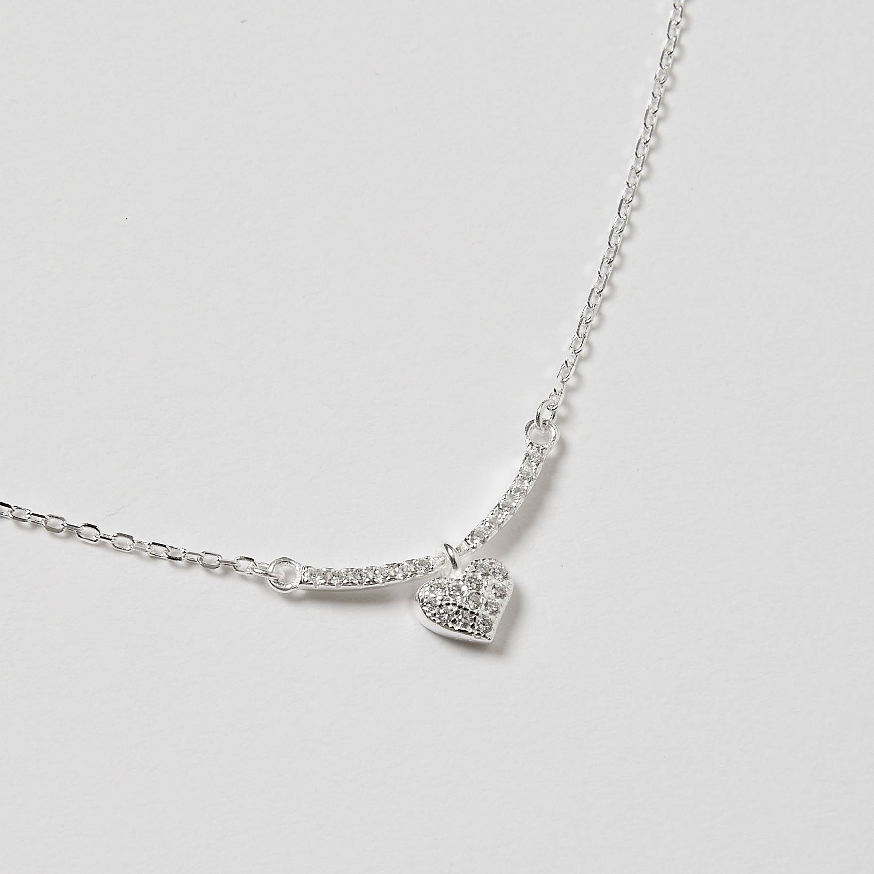 Imagem Secundária Colar entremeio curva cravejada 17mm pingente coração cravejado 50cm