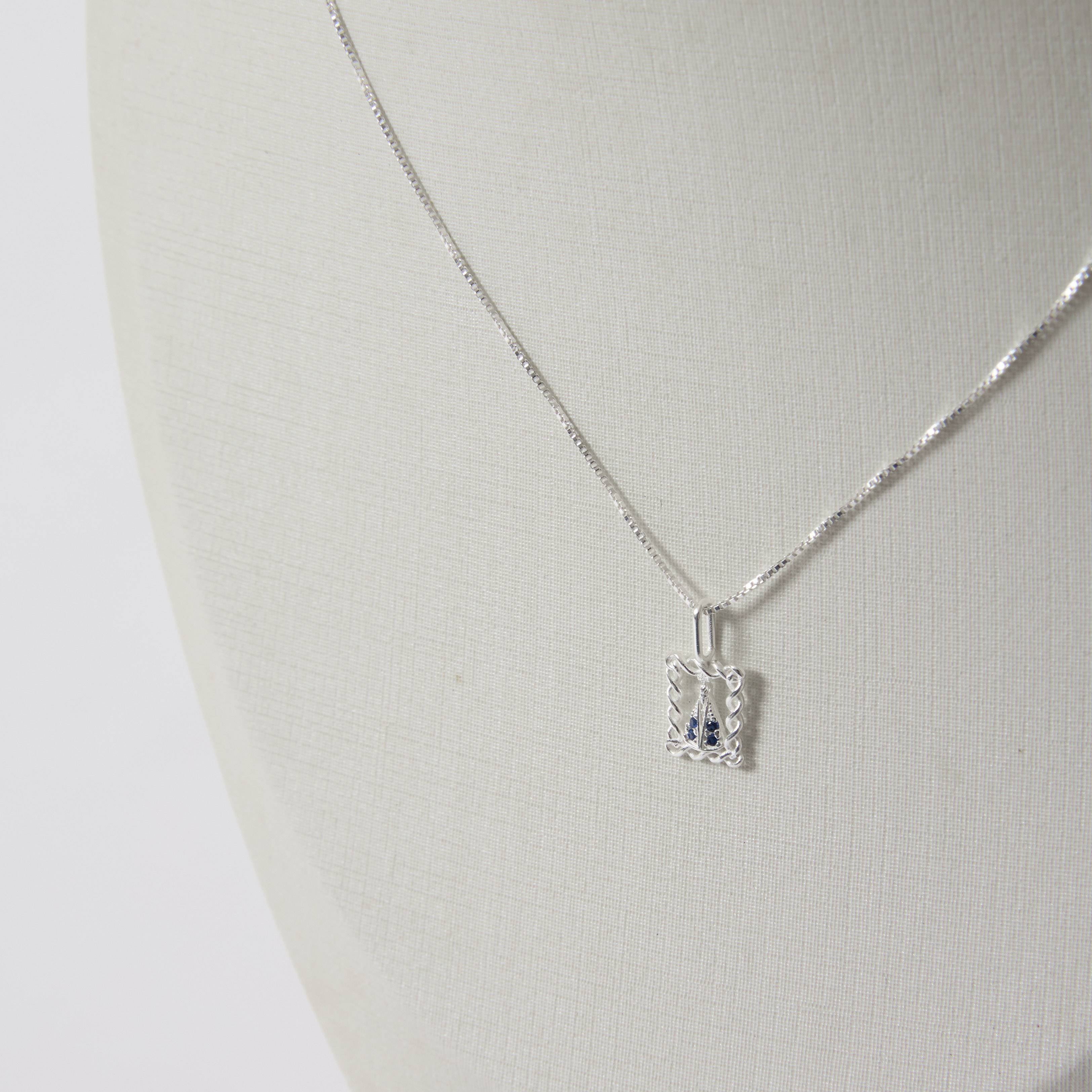 Imagem Secundária Colar pingente medalha Nsa. Sra. Aparecida cravejada azul 9mm 45cm