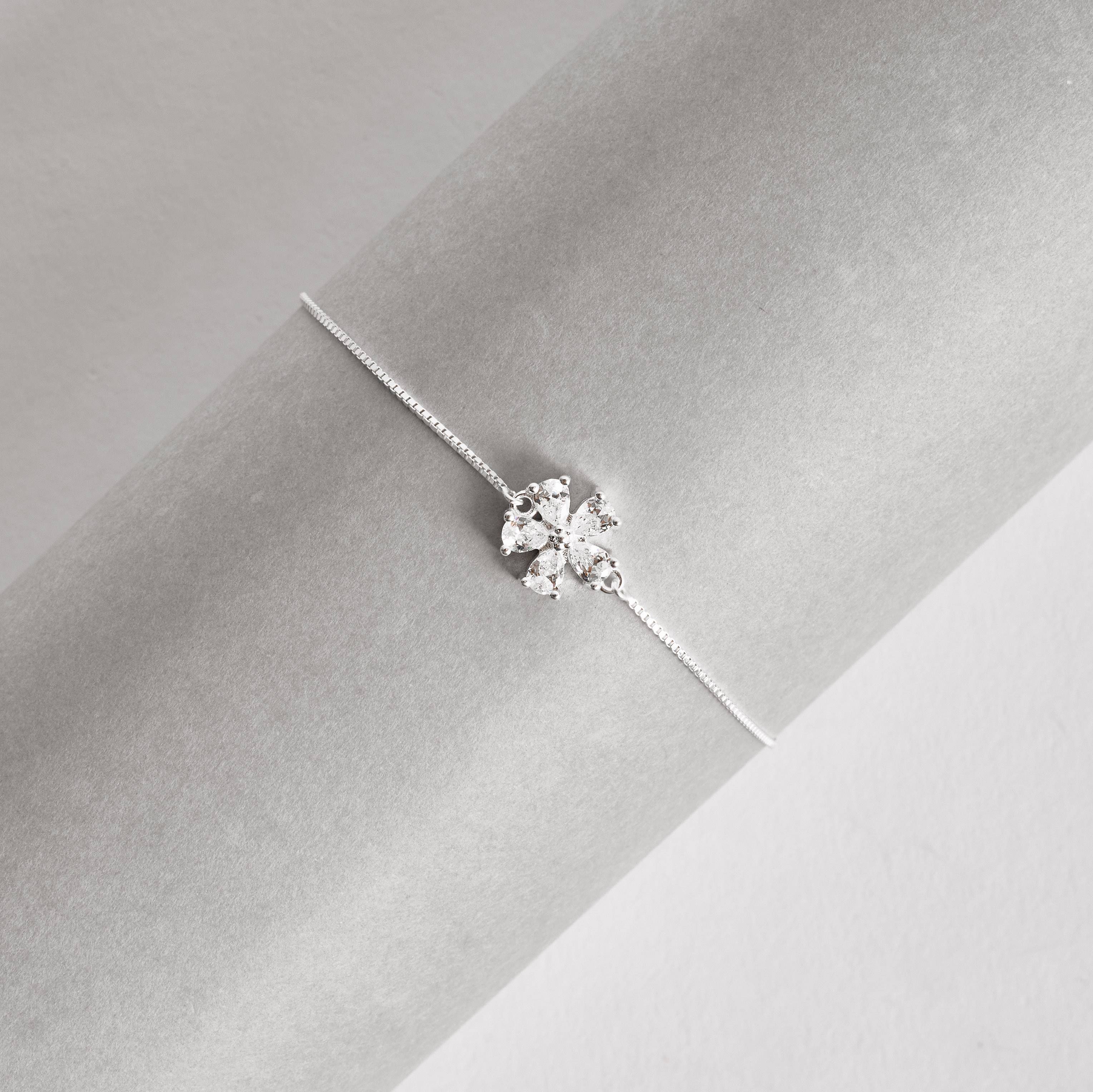 Pulseira entremeio flor cravejada cristal 11mm 16+4cm