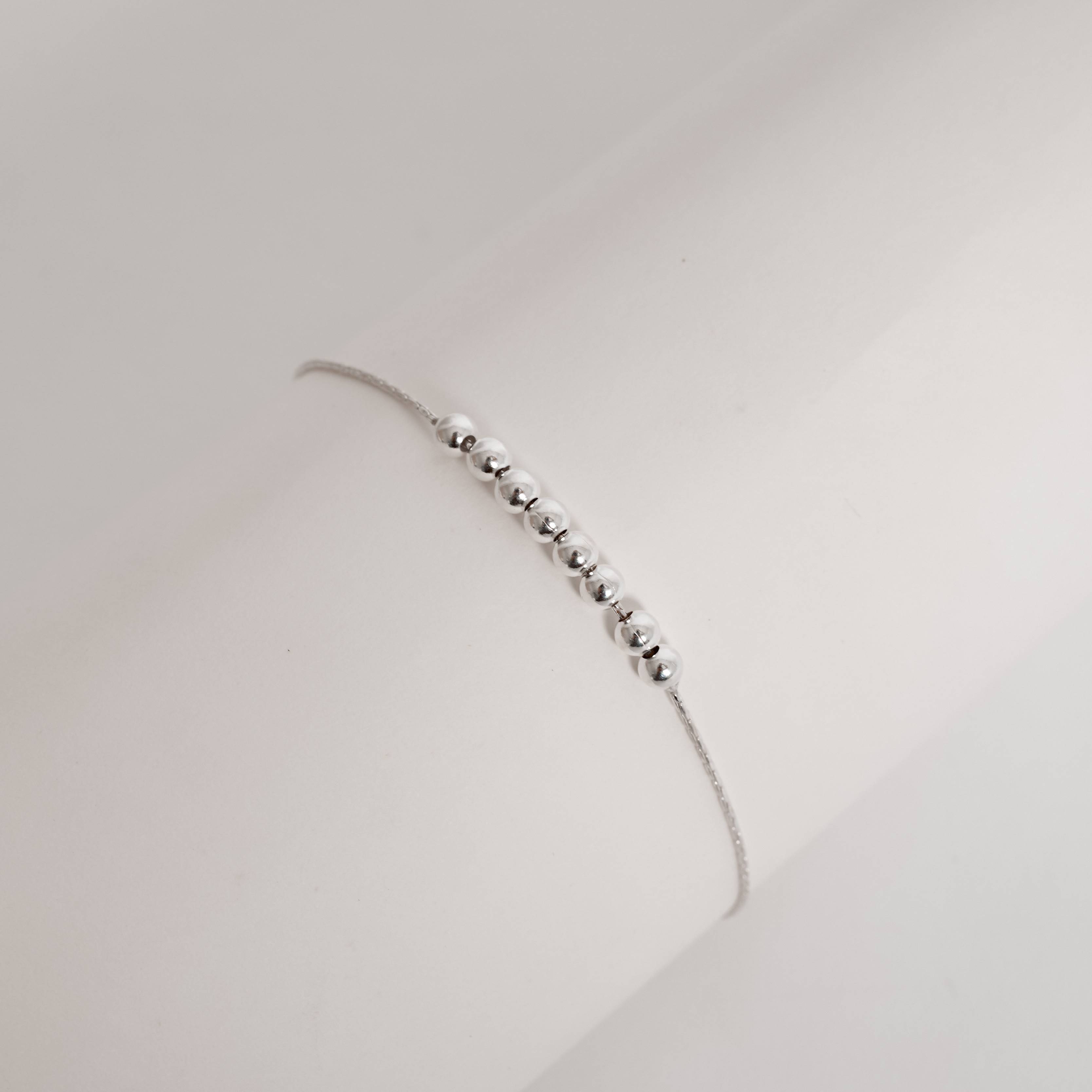 Pulseira entremeio bolas 4mm regulável fecho bola