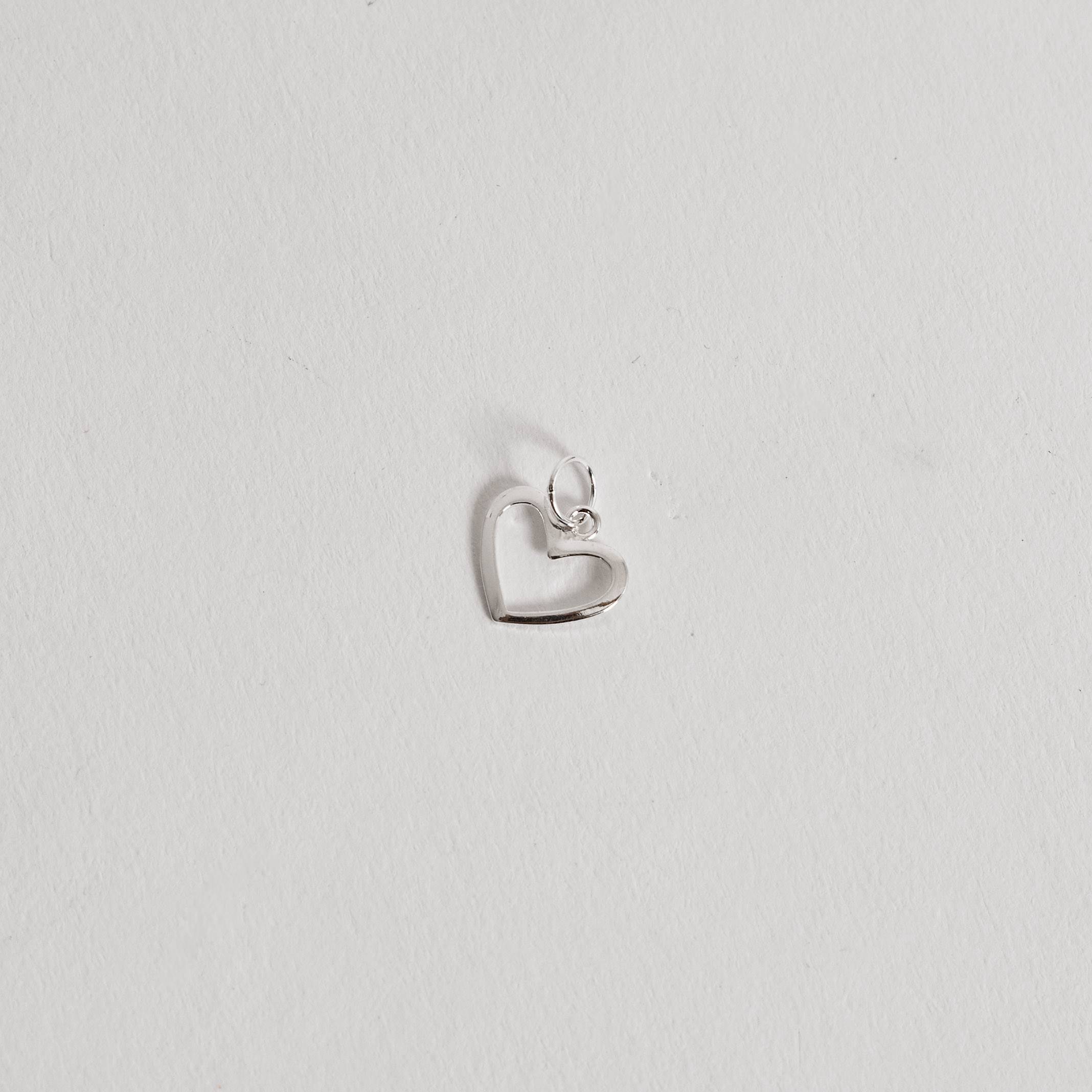 Imagem Secundária Pingente coração vazado 11mm