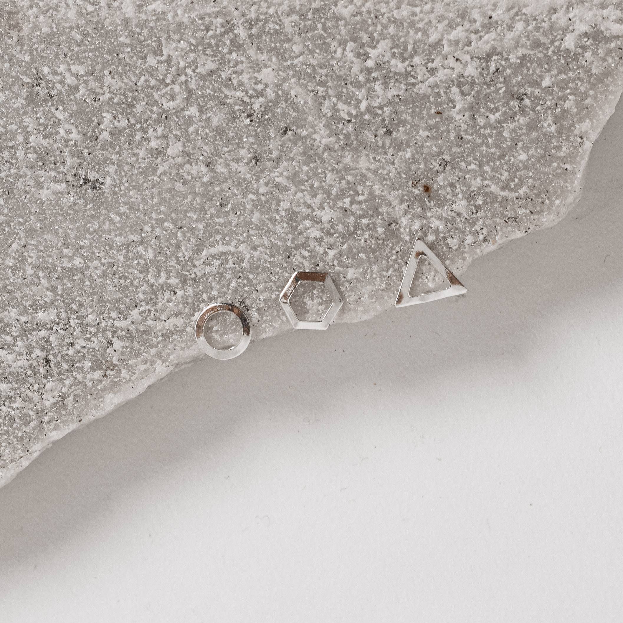 Trio triângulo, círculo e hexágono vazados