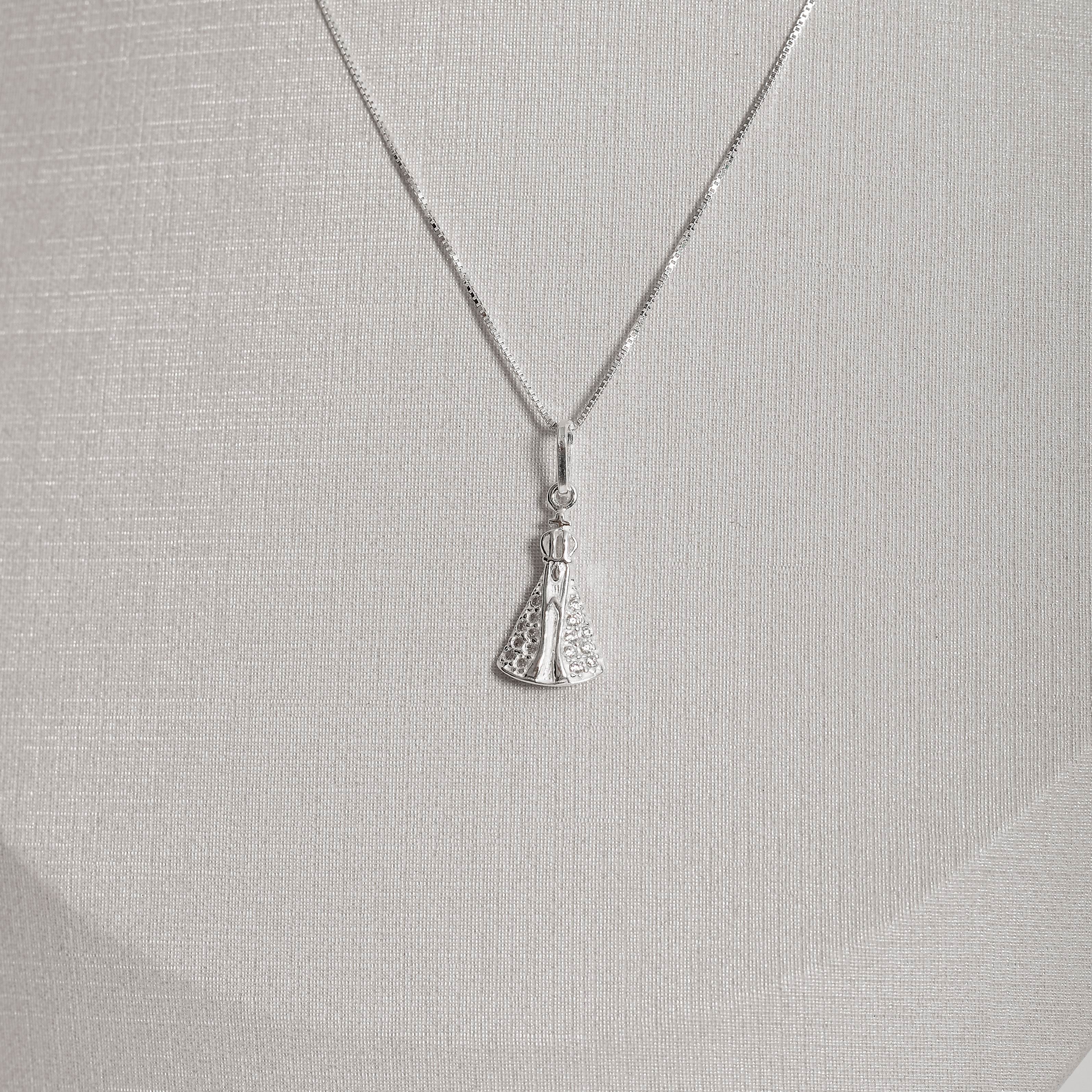 Imagem Secundária Colar pingente Nsa. Sra. Aparecida com cravejado 17mm 45cm