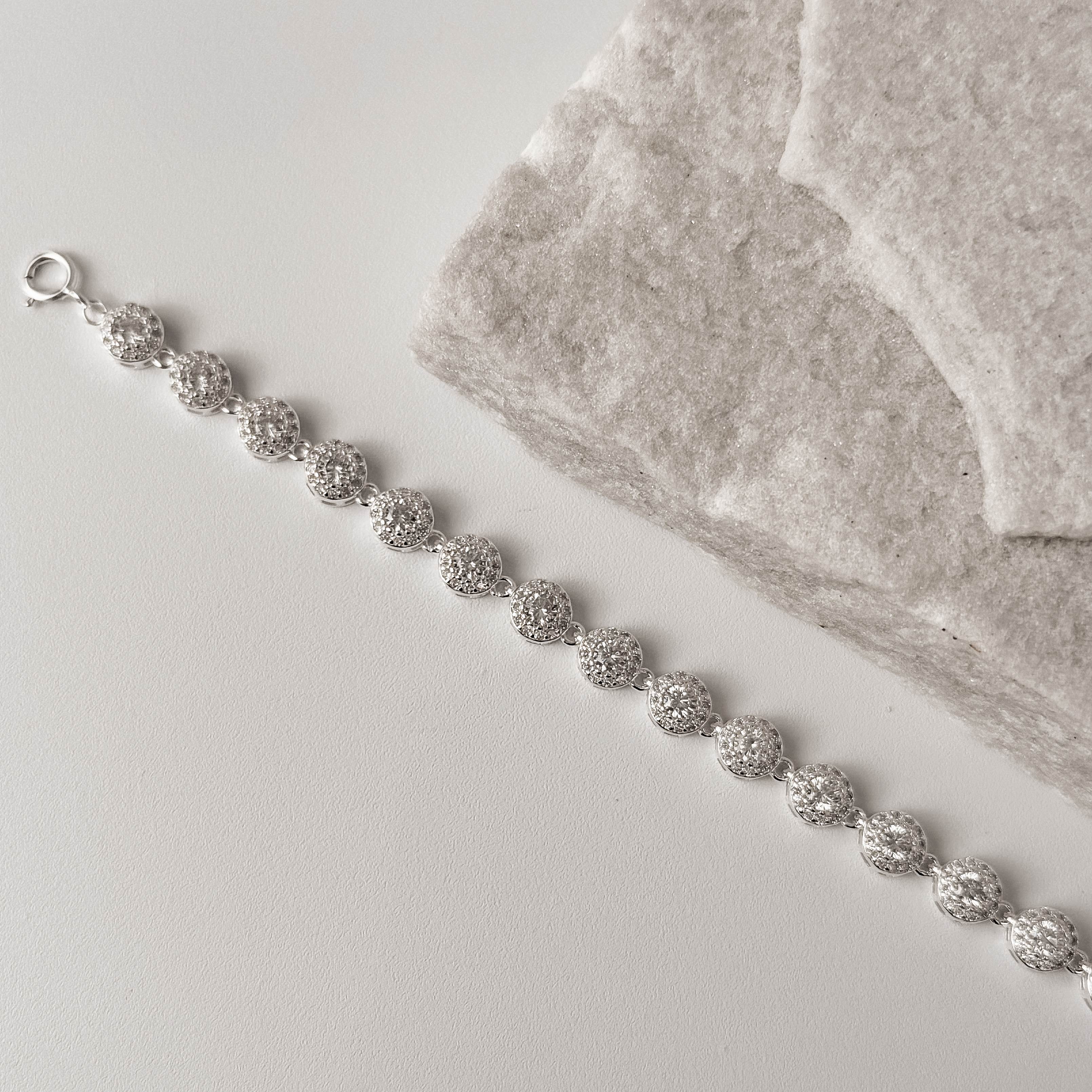 Pulseira entremeios zircônias redonda com cravejado 5.9 16+4cm