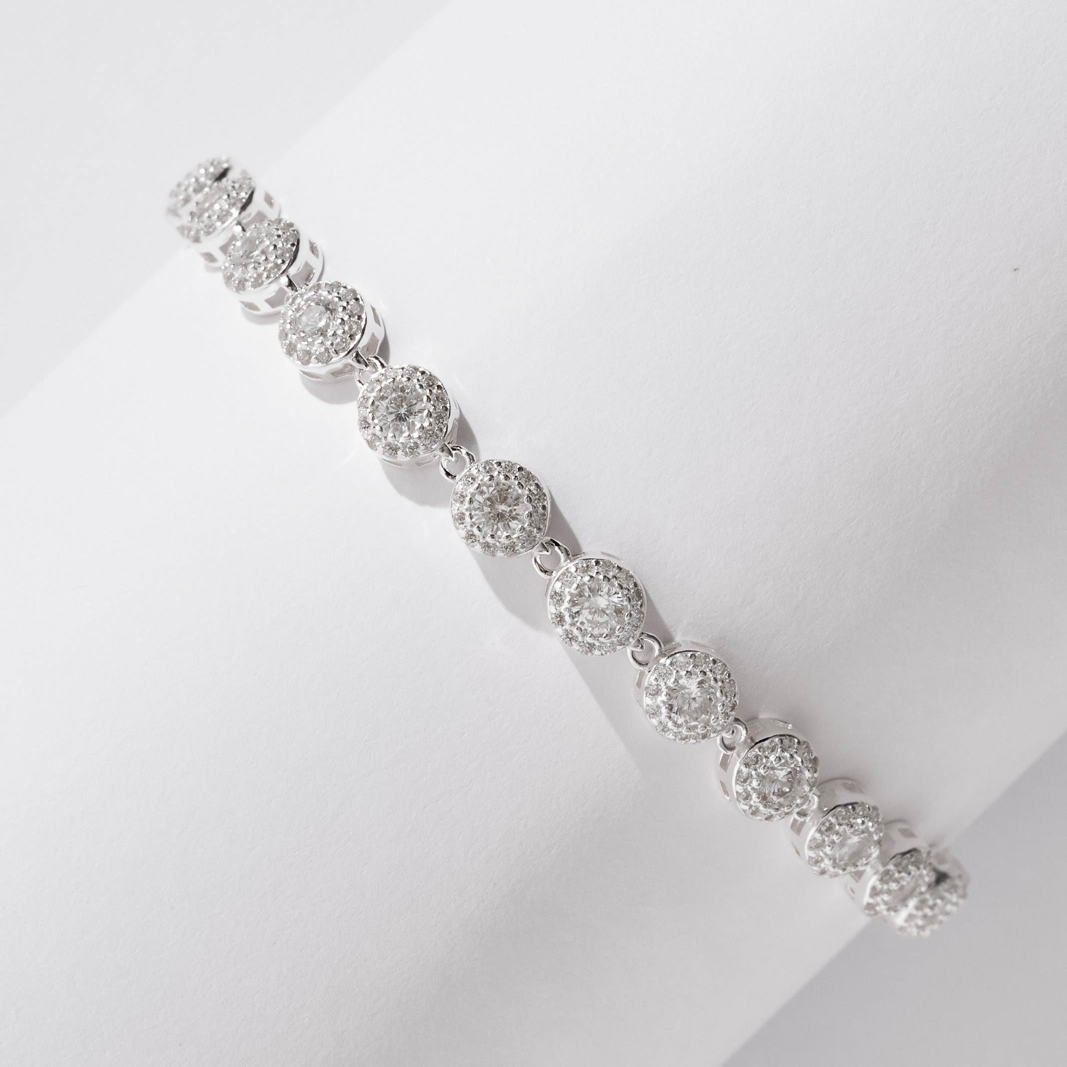 Pulseira entremeios zircônias redonda com cravejado 5.8 19cm com 2 fechos