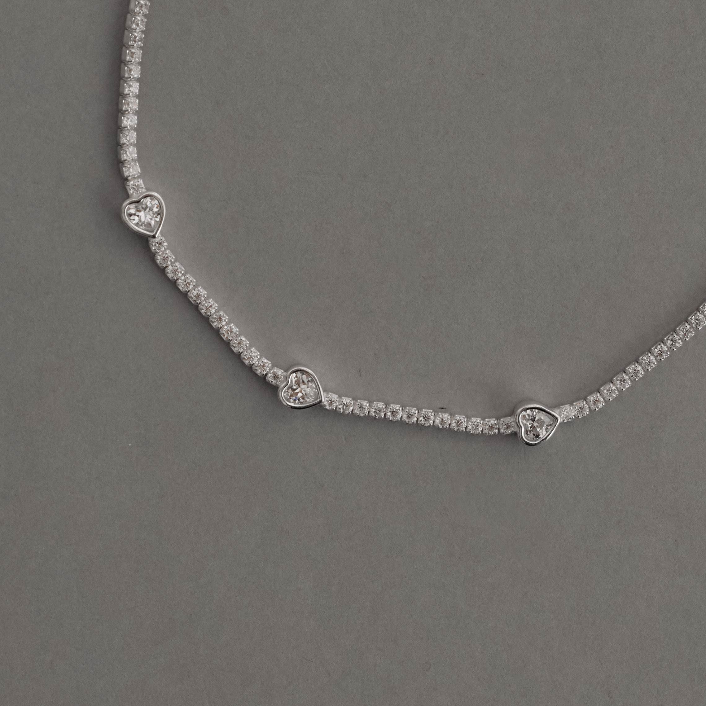 Imagem Secundária Pulseira Riviera 2.0 com entremeios zircônias coração 16+4cm