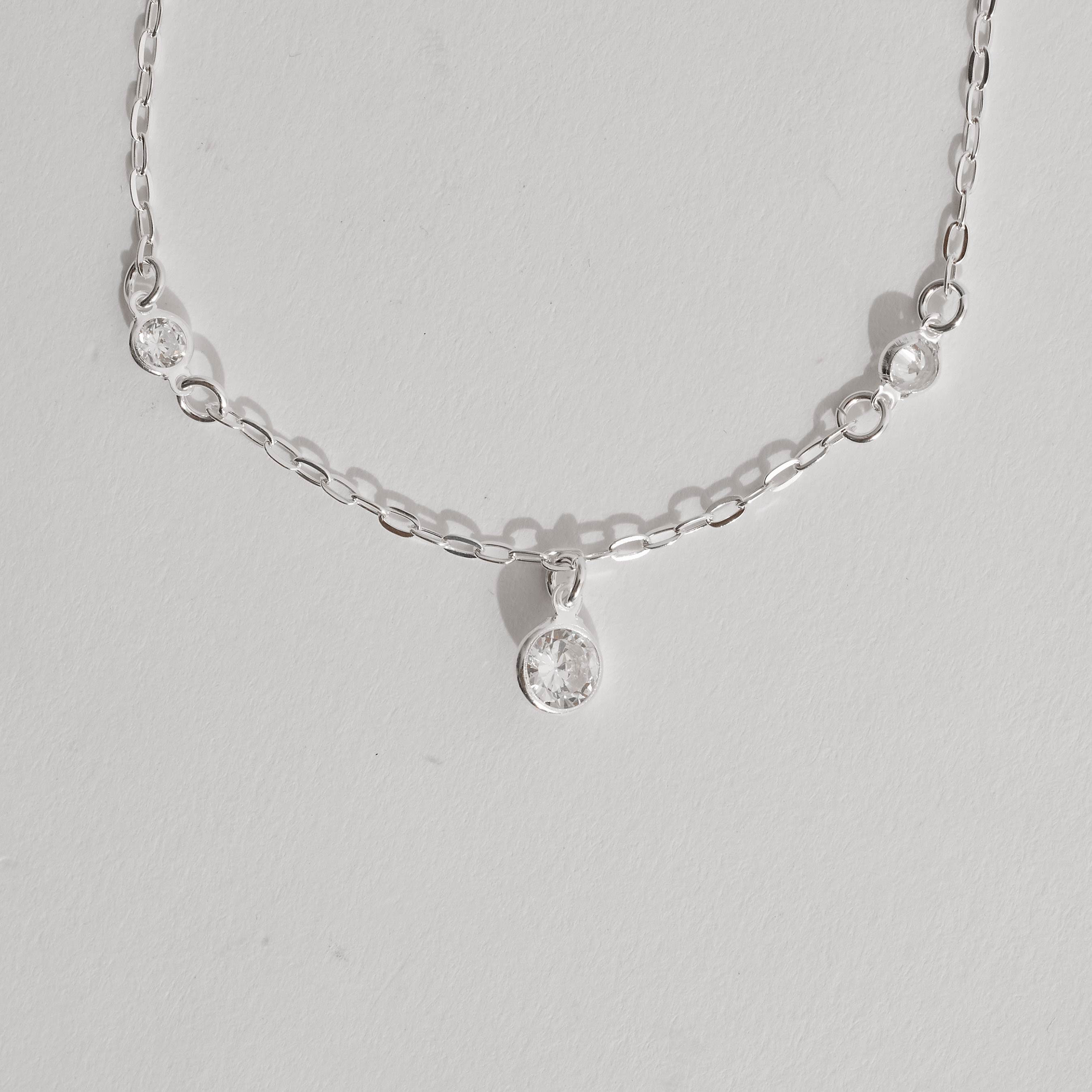 Pulseira entremeios e pingente zircônias 4 e 7mm 19cm