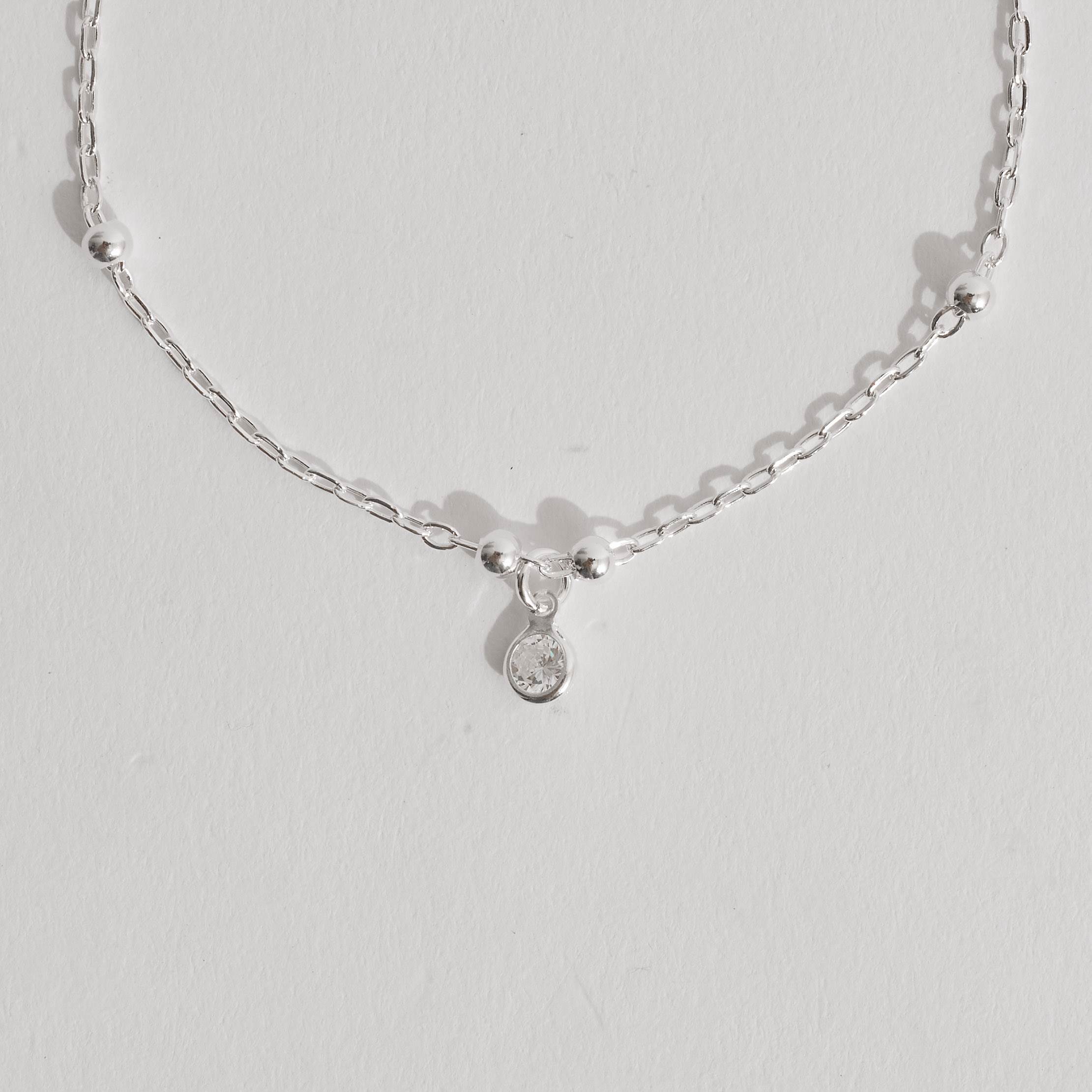 Pulseira infantil entremeio bolas 3mm e pingente zircônia 4mm 15cm