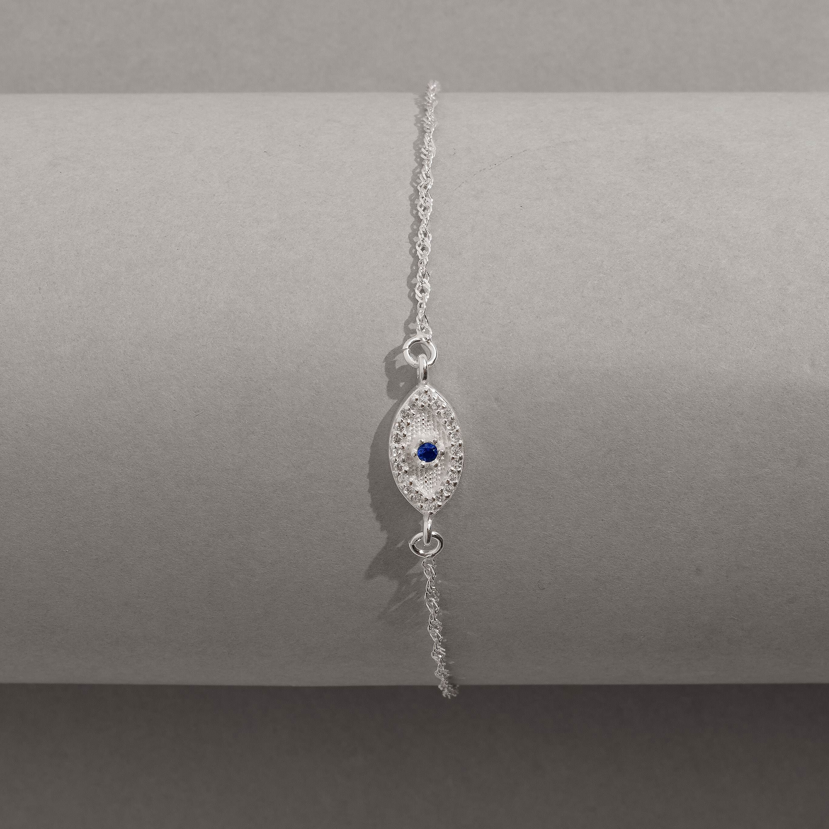 Imagem Secundária Pulseira entremeio olho grego cravejado 12mm corrente singapura