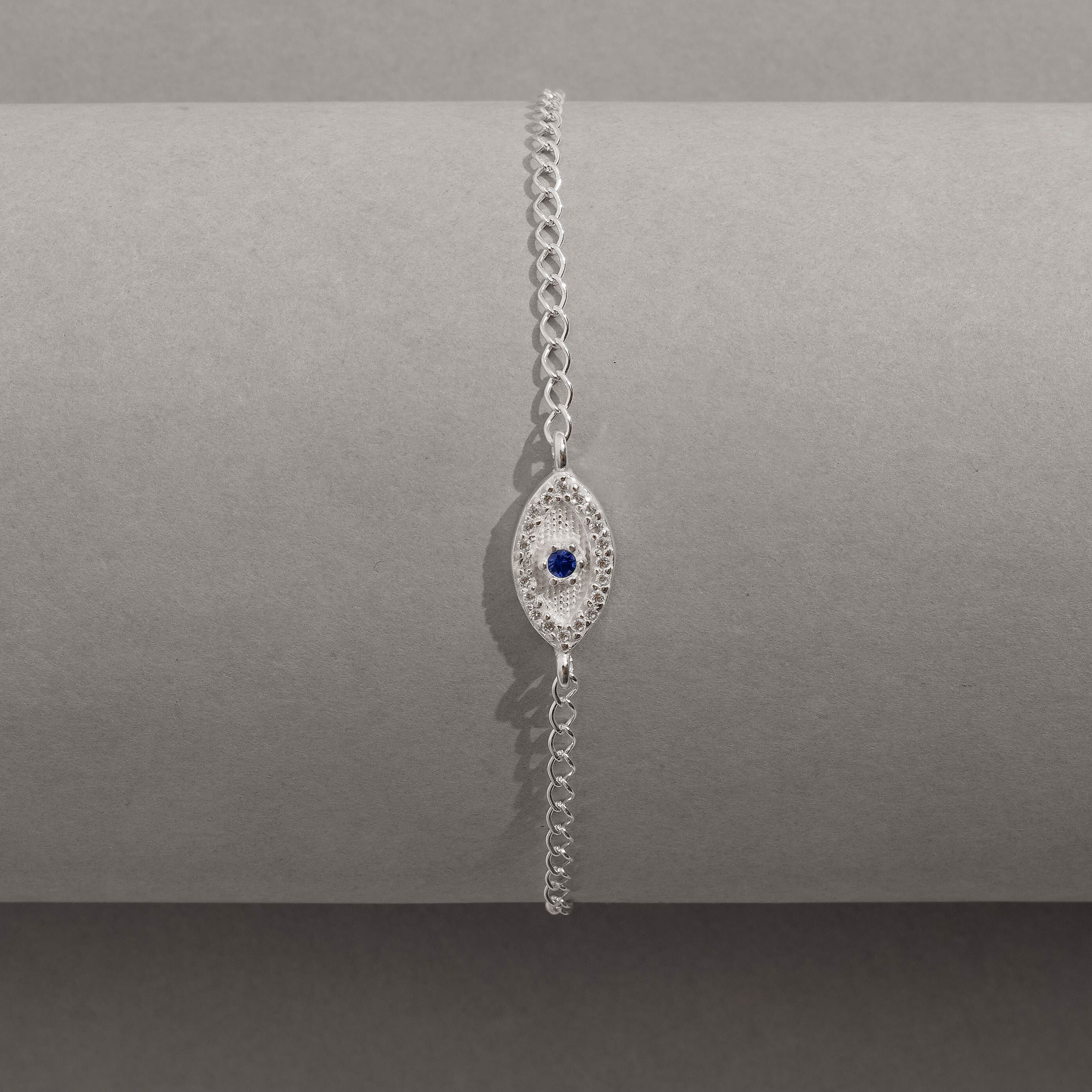 Pulseira entremeio olho cravejado detalhe zircônia azul 12mm
