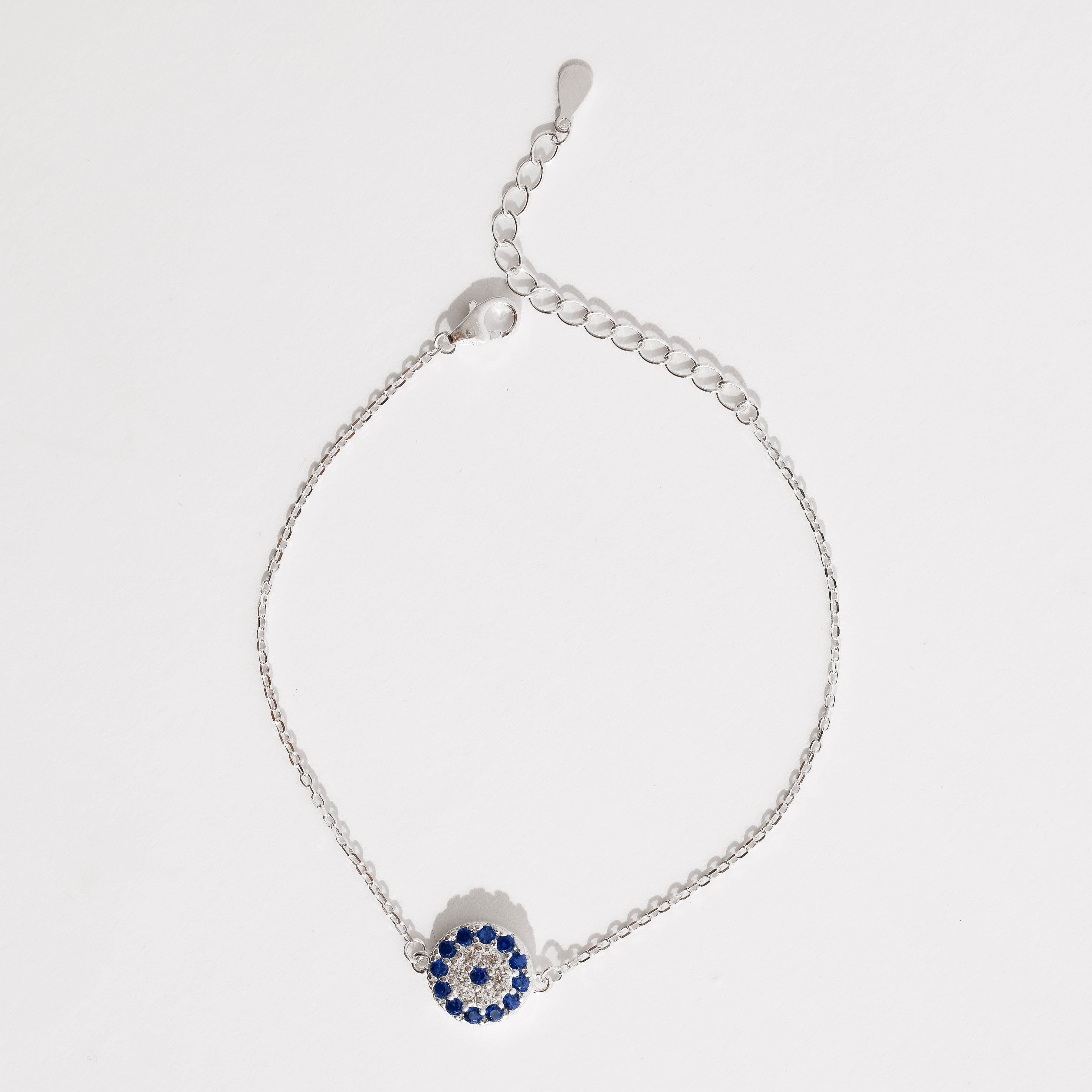 Pulseira entremeio círculo cravejado cristal e azul 10mm