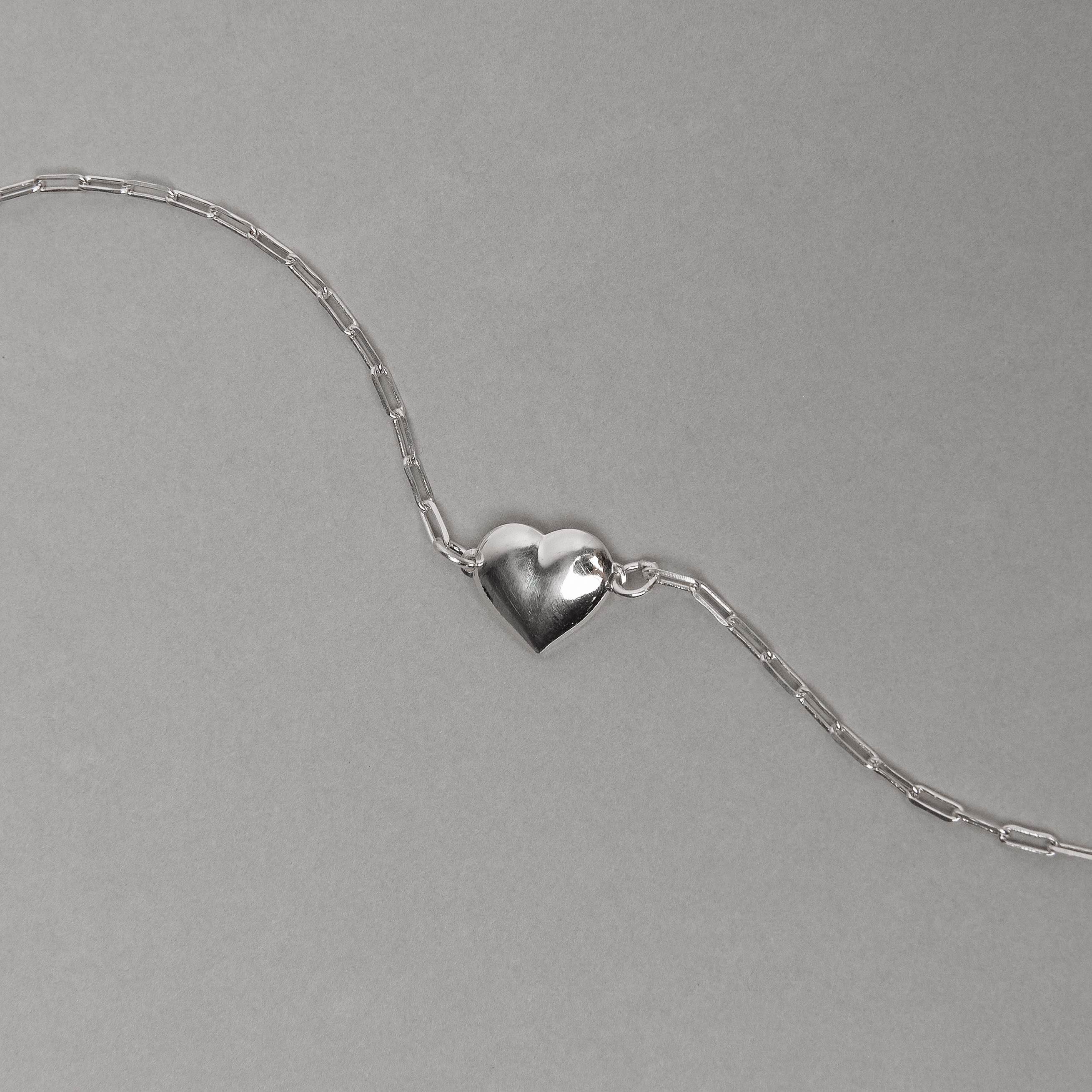 Imagem Secundária Pulseira entremeio coração liso 10mm corrente cartier