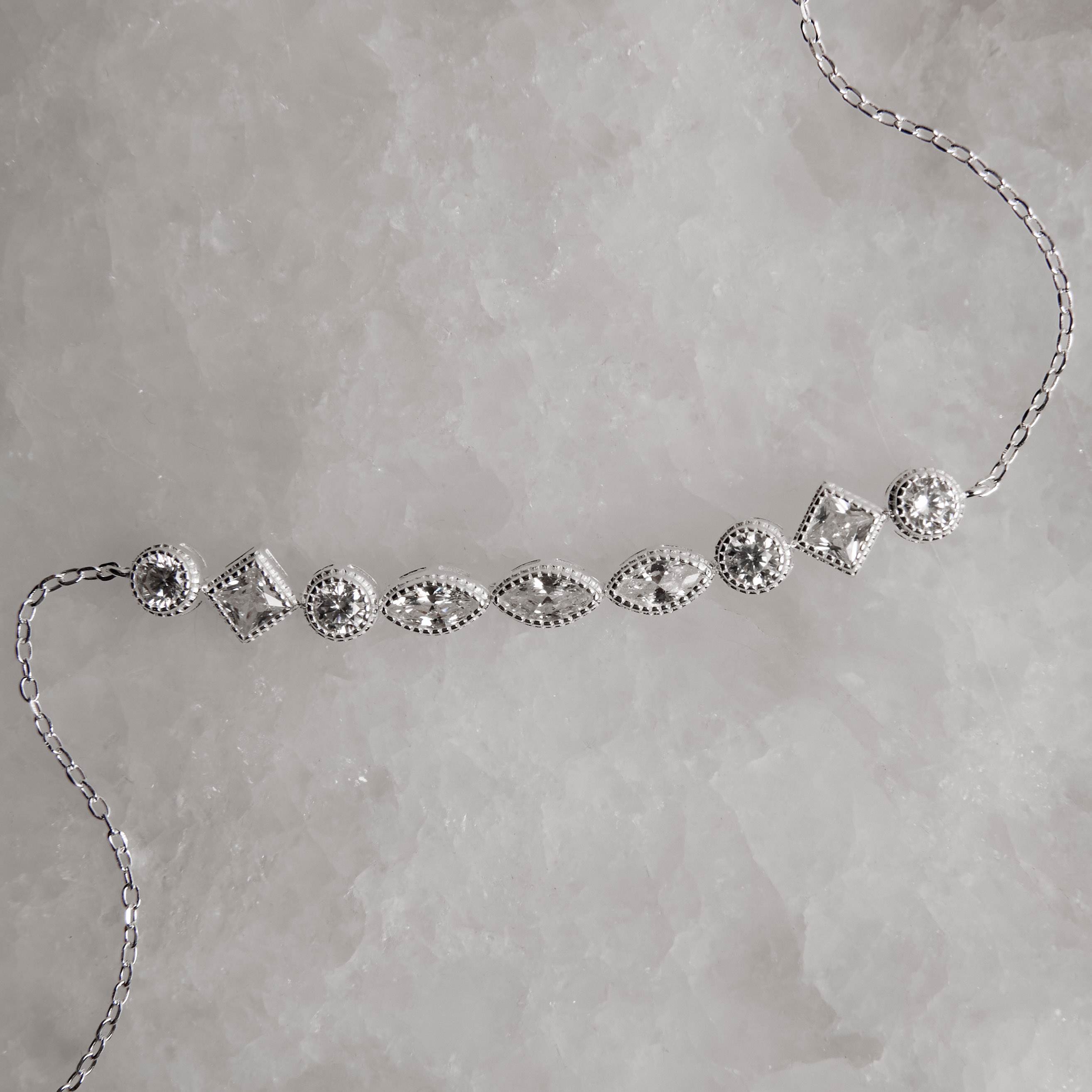 Pulseira entremeio zircônias redonda, losango e navete corrente cadeado 16+4cm