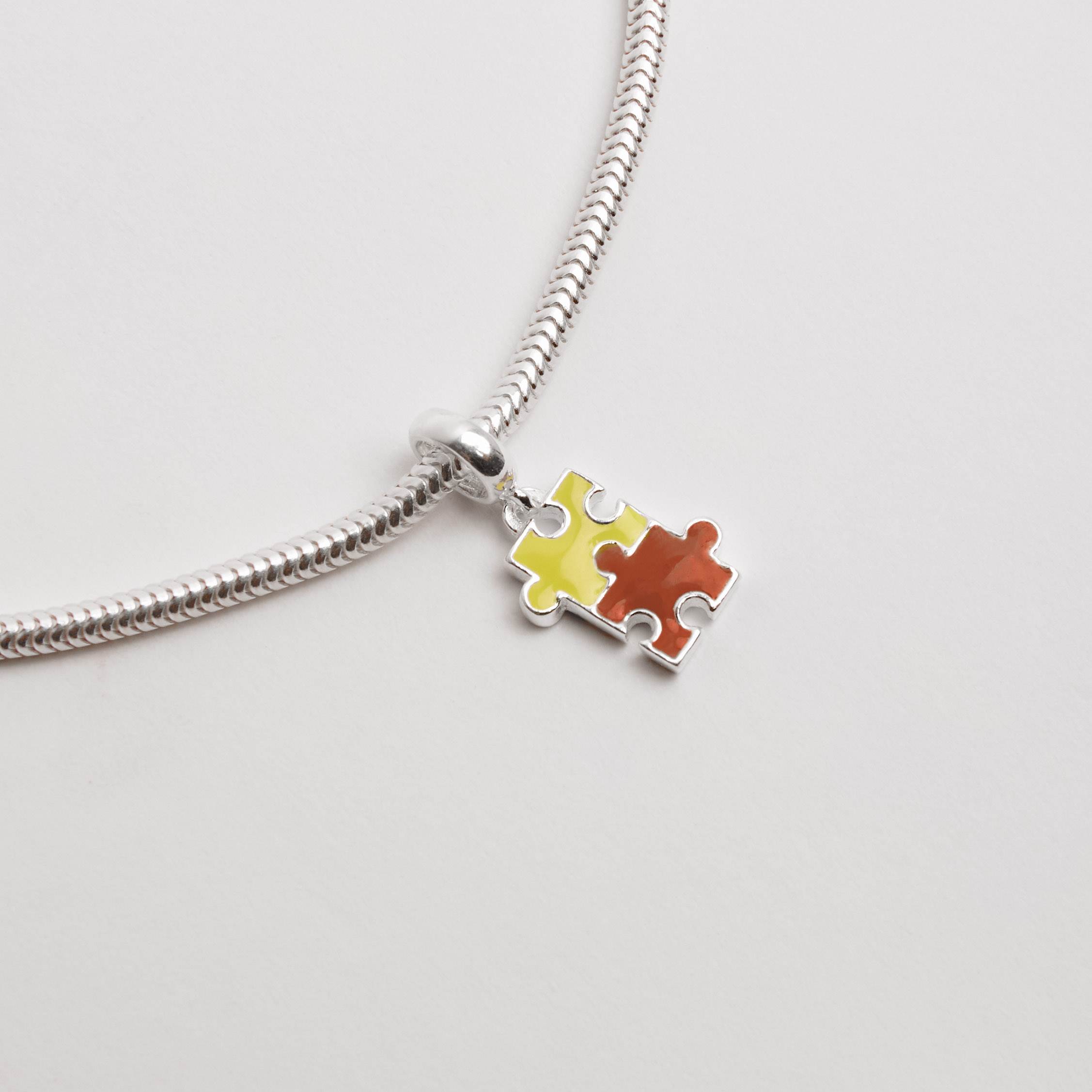 Imagem Secundária Berloque pingente símbolo autismo 13mm resina