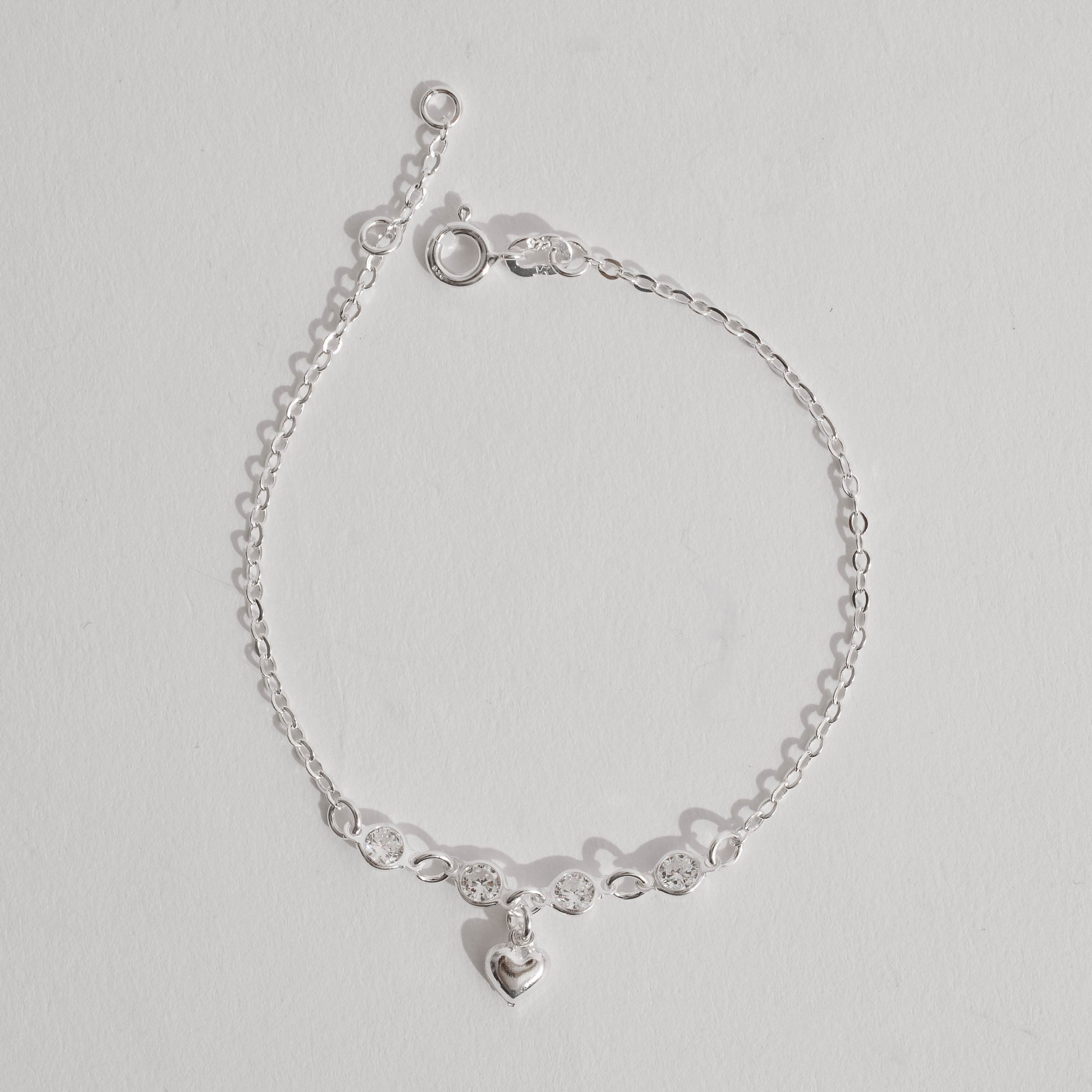 Pulseira entremeio zircônias 4mm pingente coração vazado 19cm