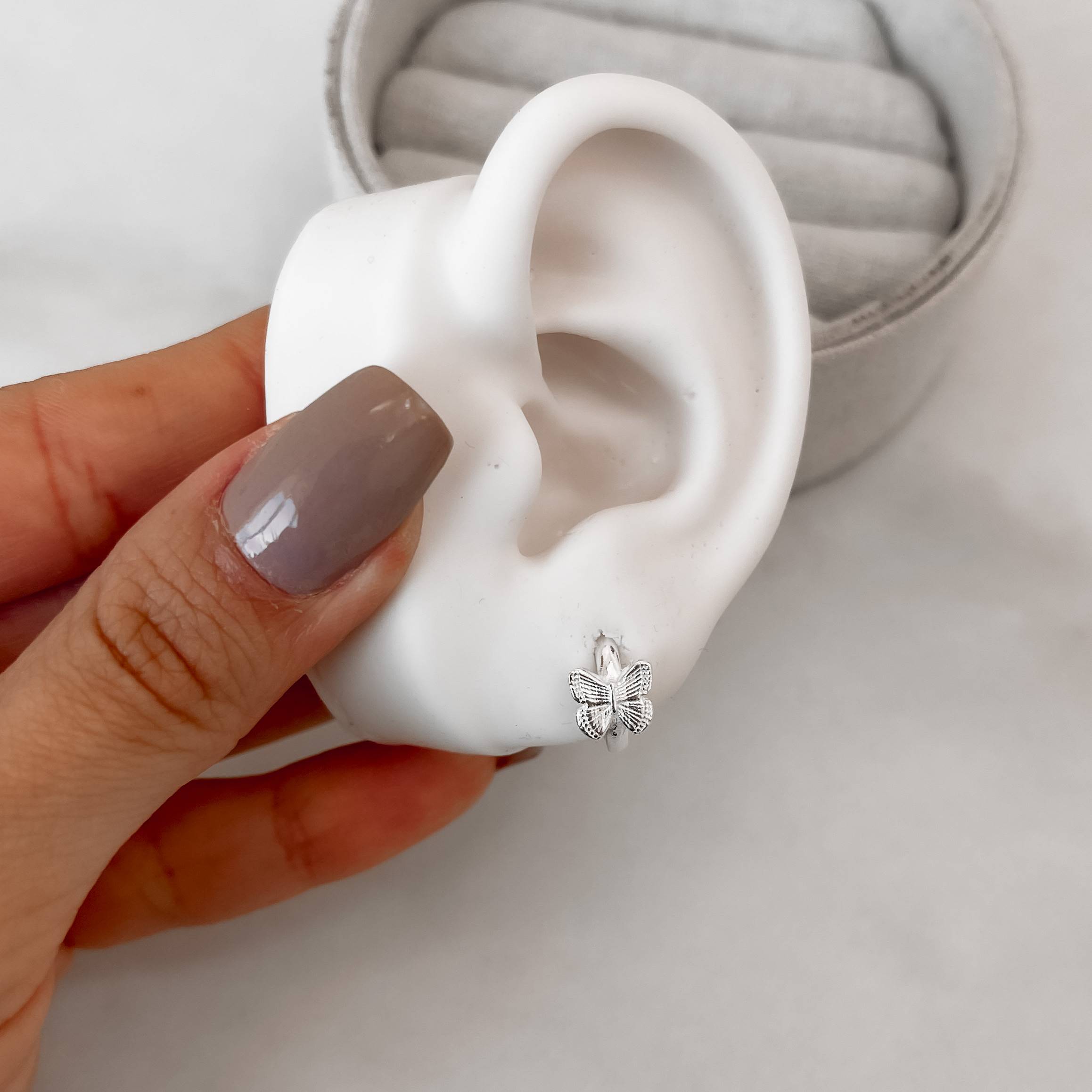 Imagem Secundária Argola click 11mm detalhe borboleta