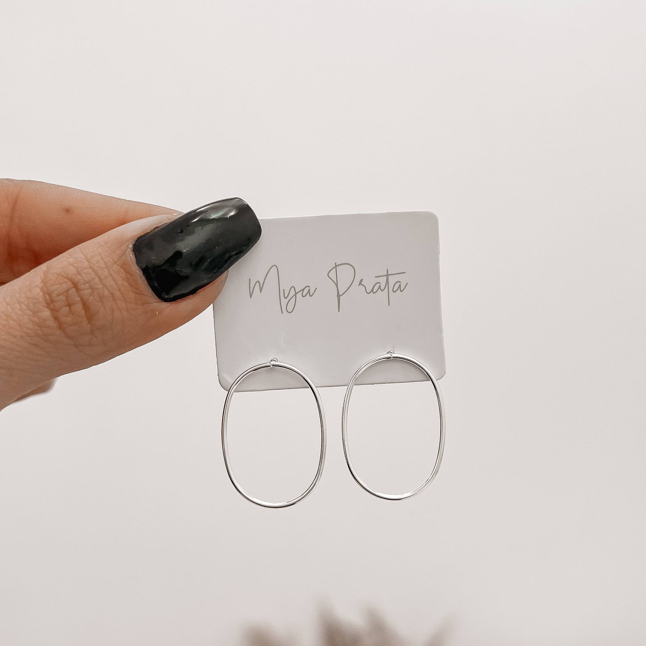 Imagem Secundária Brinco oval vazado 26mm