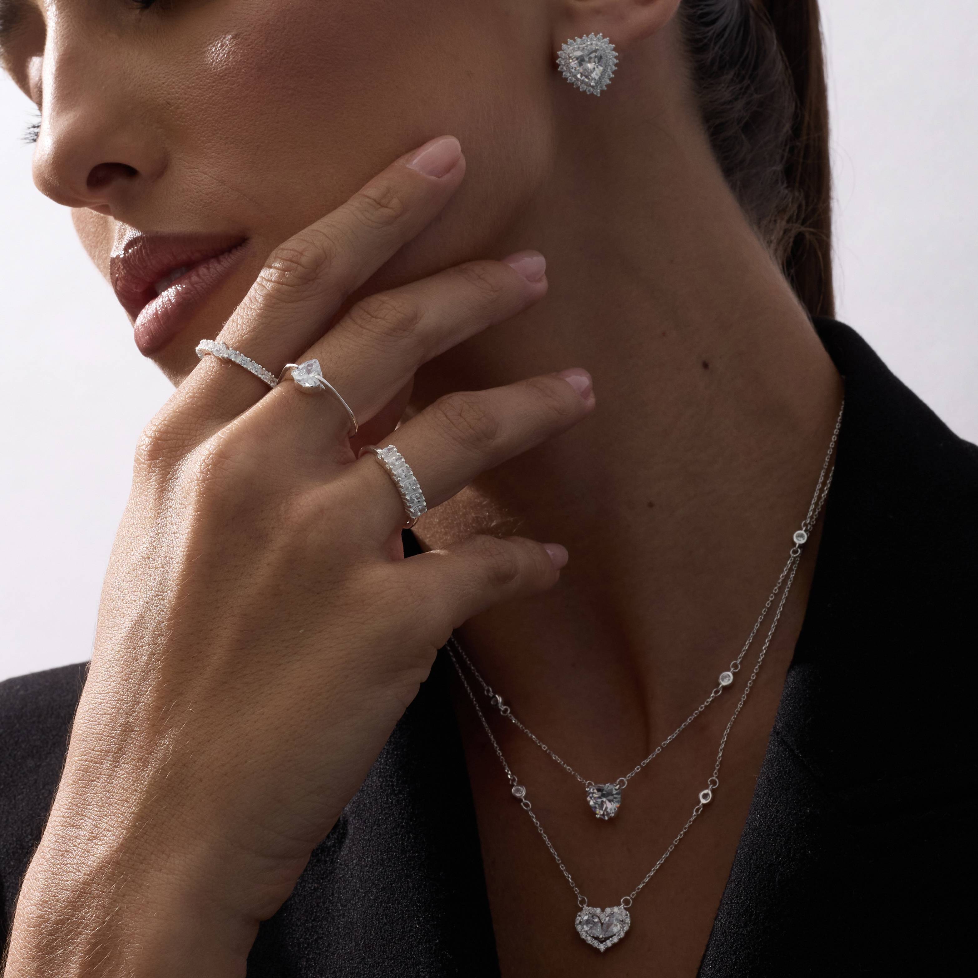 Imagem Secundária Anel solitário 2 garras zircônia coração