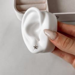 Brinco estrela lisa 7mm