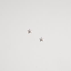 Brinco estrela lisa 7mm